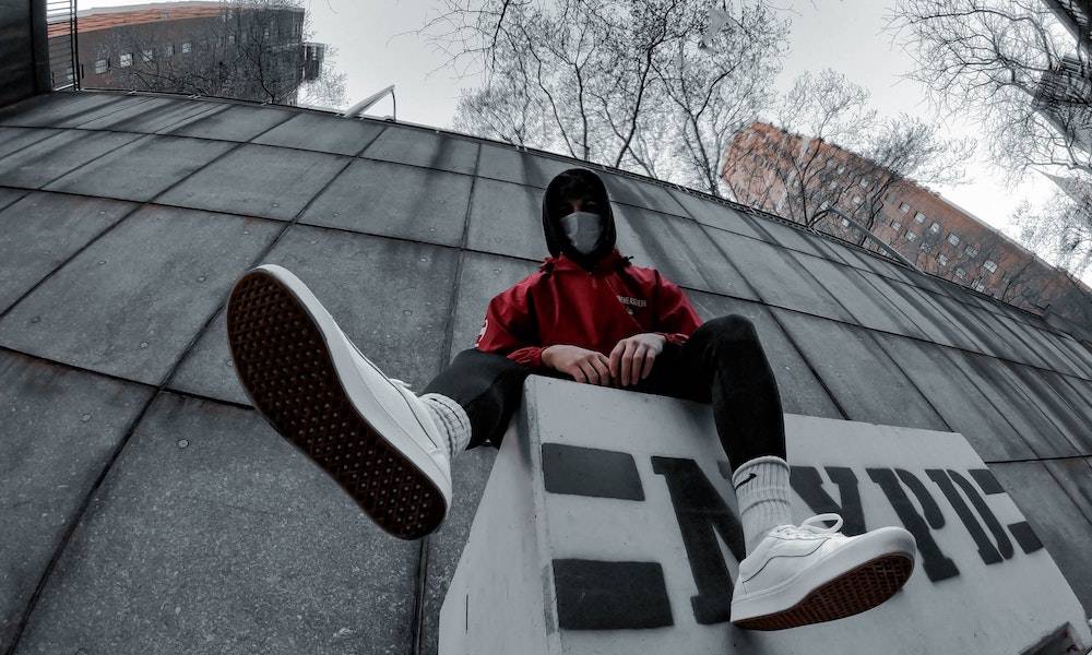 Masked boy with sneakers